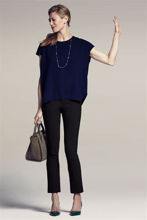 navy top with black pants